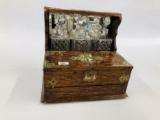 AN ANTIQUE OAK CELLAR BOX WITH BRASS BONDING ALONG WITH 3 GLASS DECANTERS WITH STOPPERS,