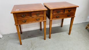 A PAIR OF REPRODUCTION CHERRYWOOD FINISH THREE DRAWER LAMP TABLES EACH W 45CM, D 35CM, H 54CM.