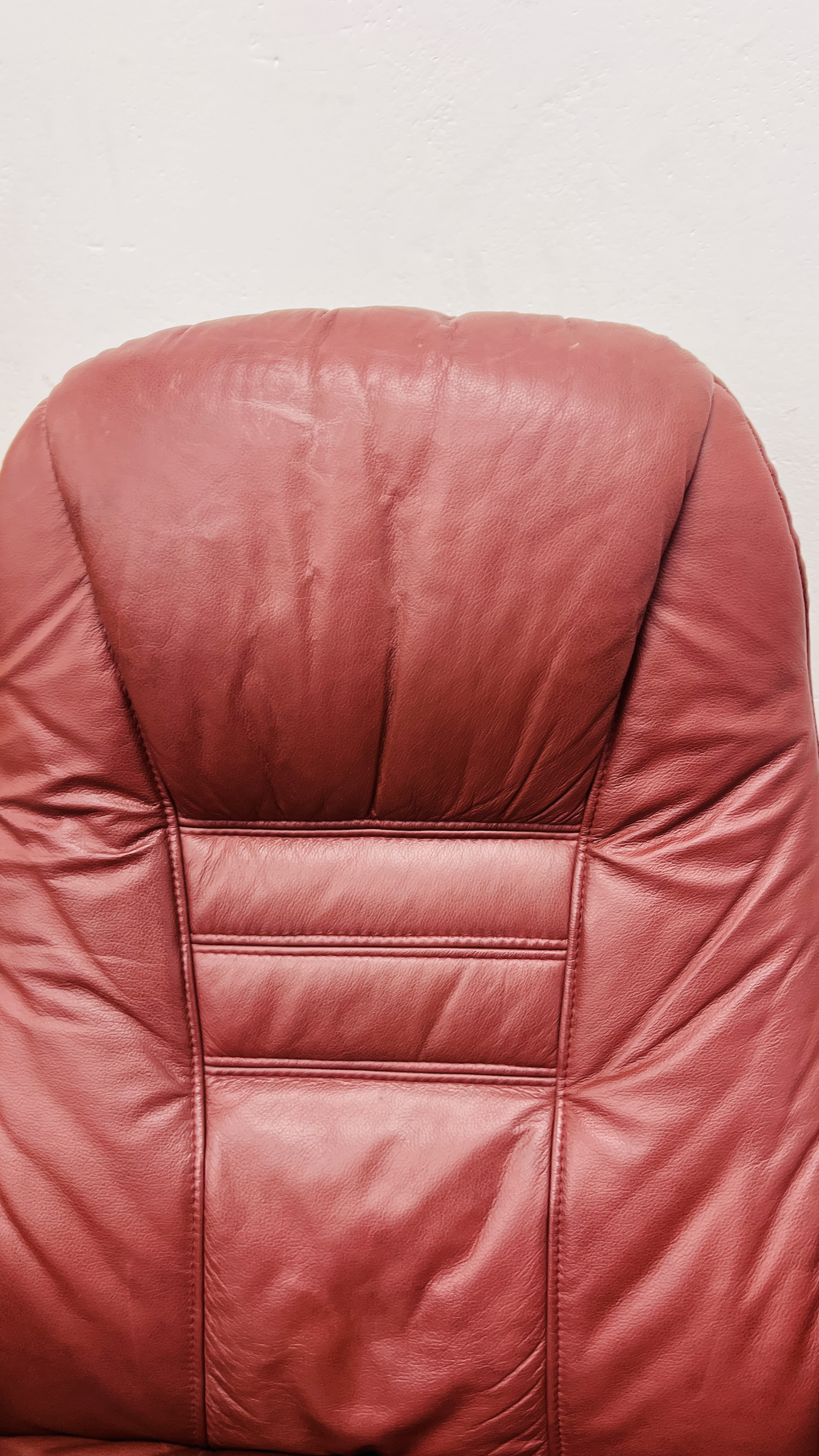 A PAIR OF RED LEATHER REVOLVING ARMCHAIRS WITH FOOTSTOOLS. - Image 21 of 25