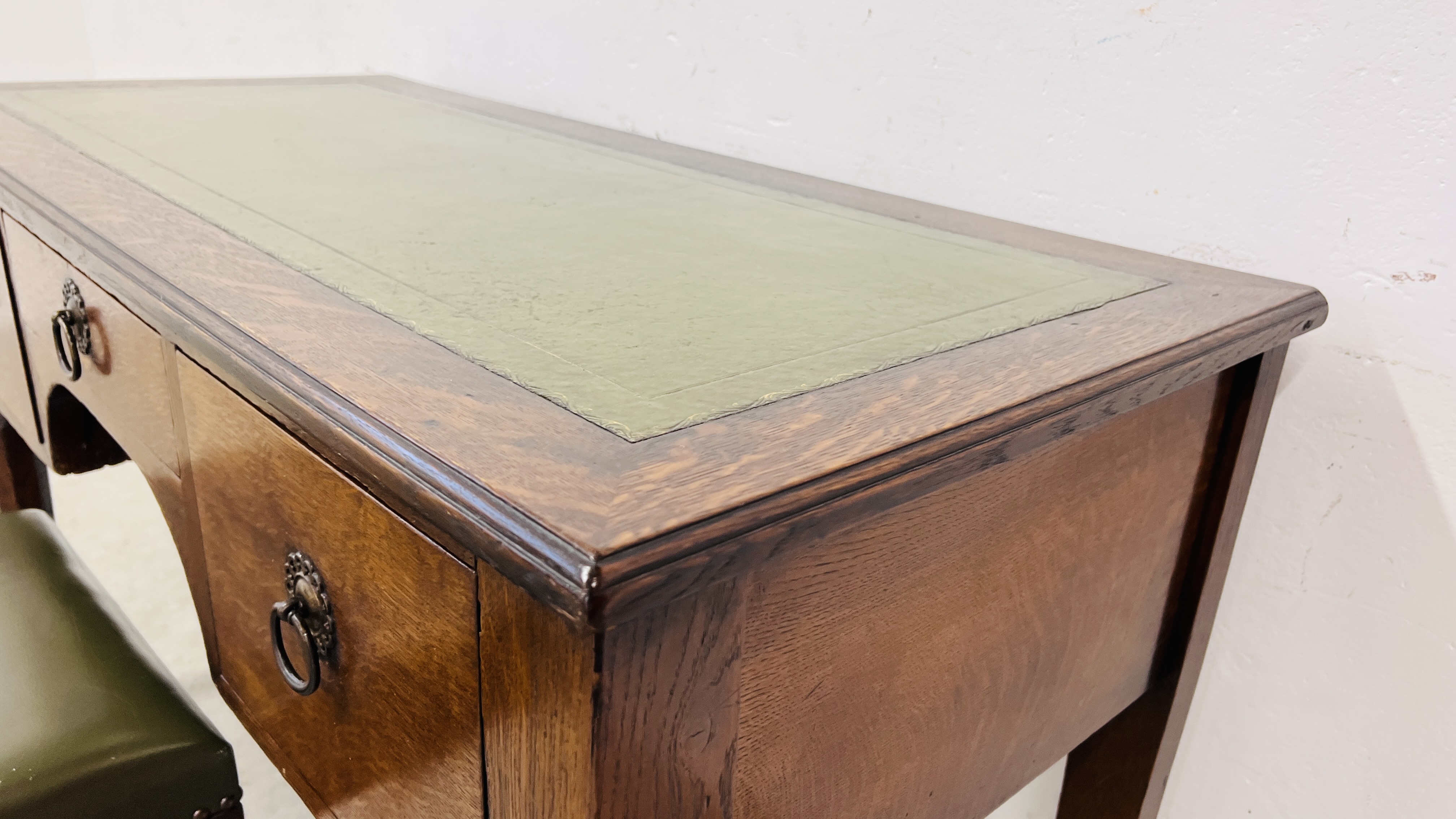 A SOLID OAK THREE DRAWER WRITING DESK WITH GREEN TOOLED LEATHERETTE WRITING SURFACE, W 120CM, - Image 4 of 16