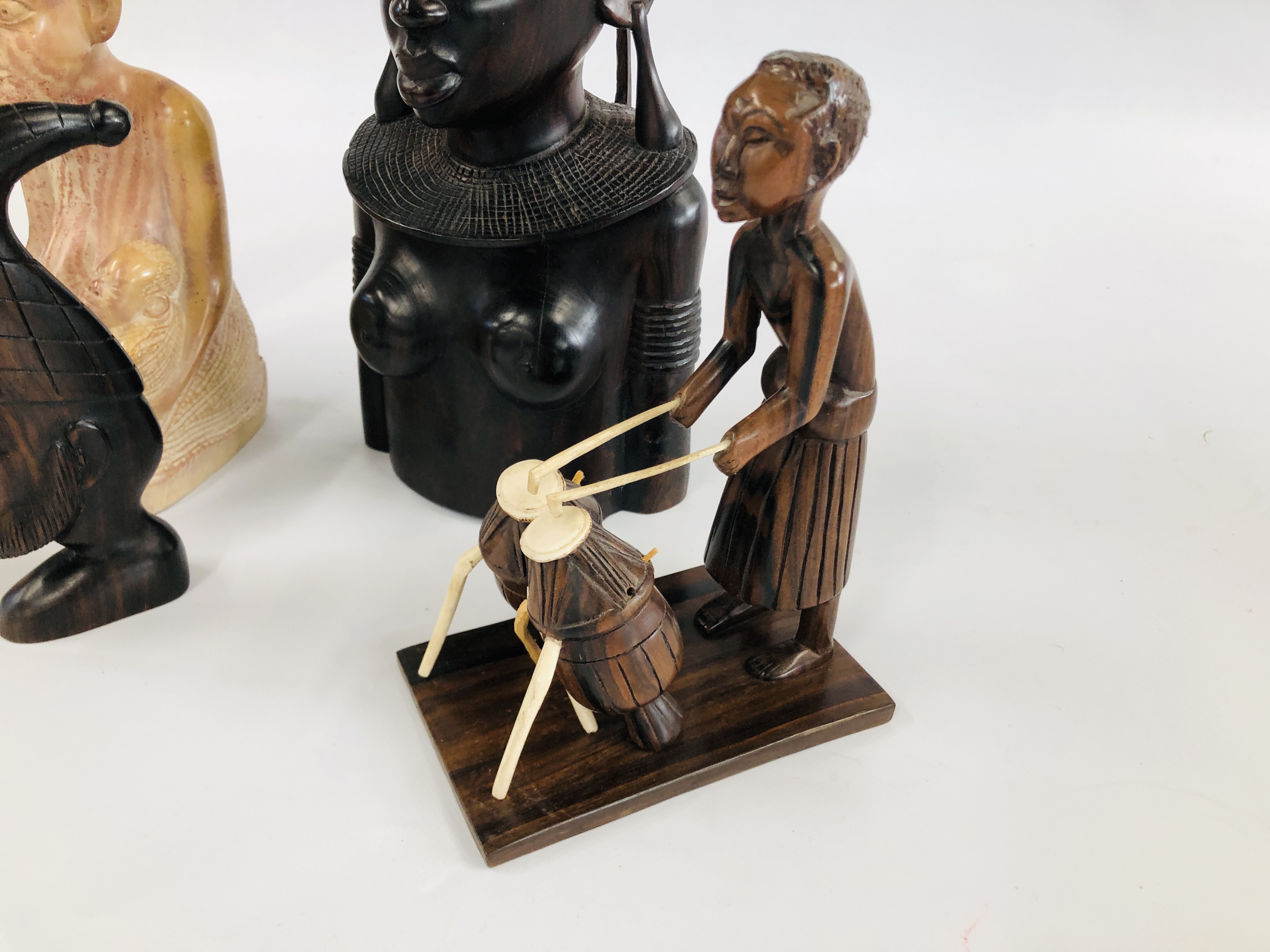 A HARD WOOD AFRICAN TRIBAL BUST ALONG WITH A FURTHER TWO FIGURES ONE OF WHICH IS HOLDING A NEW BORN - Image 2 of 5