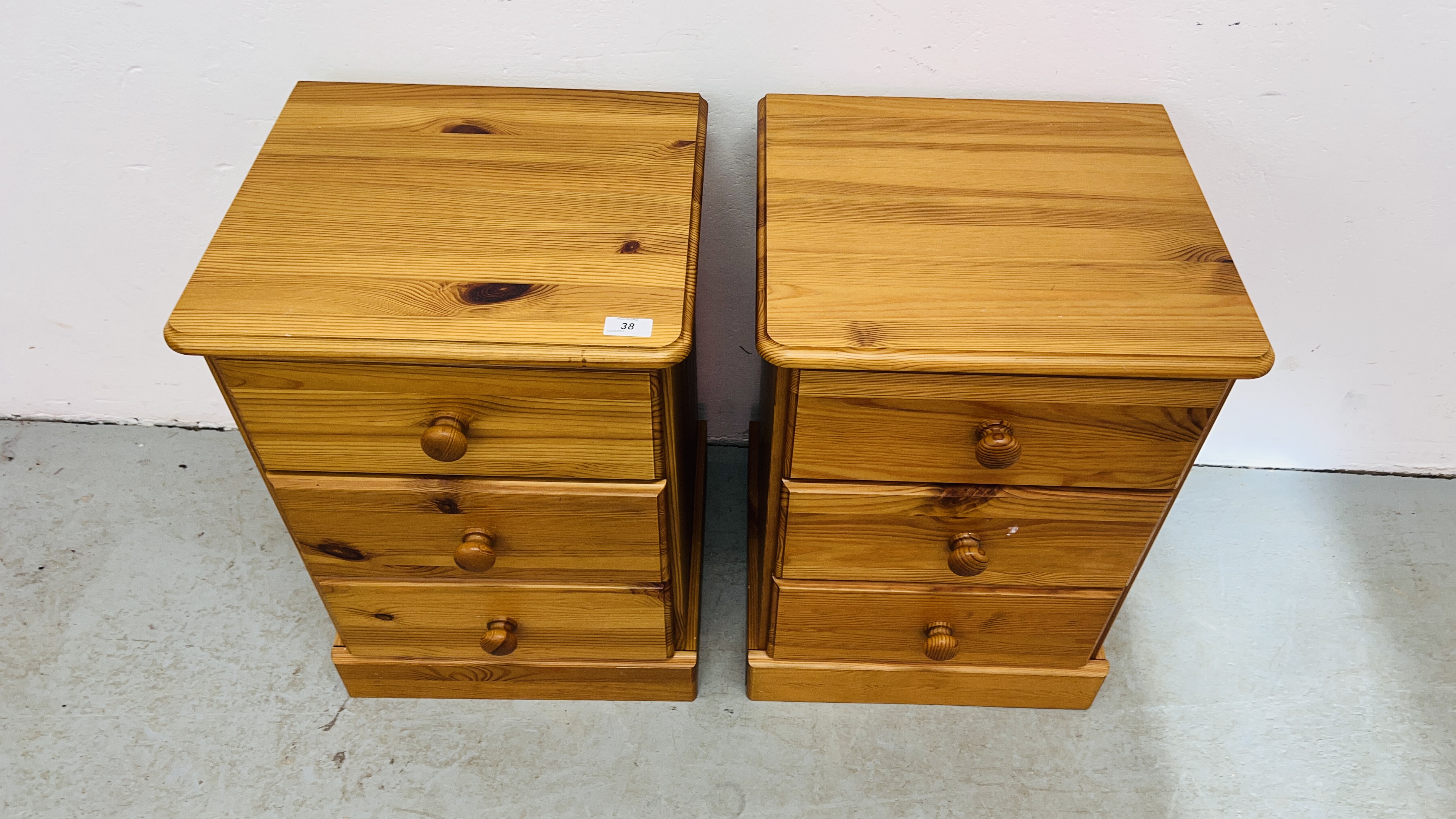 A PAIR OF PINE THREE DRAWER BEDSIDE CHESTS. - Image 2 of 5