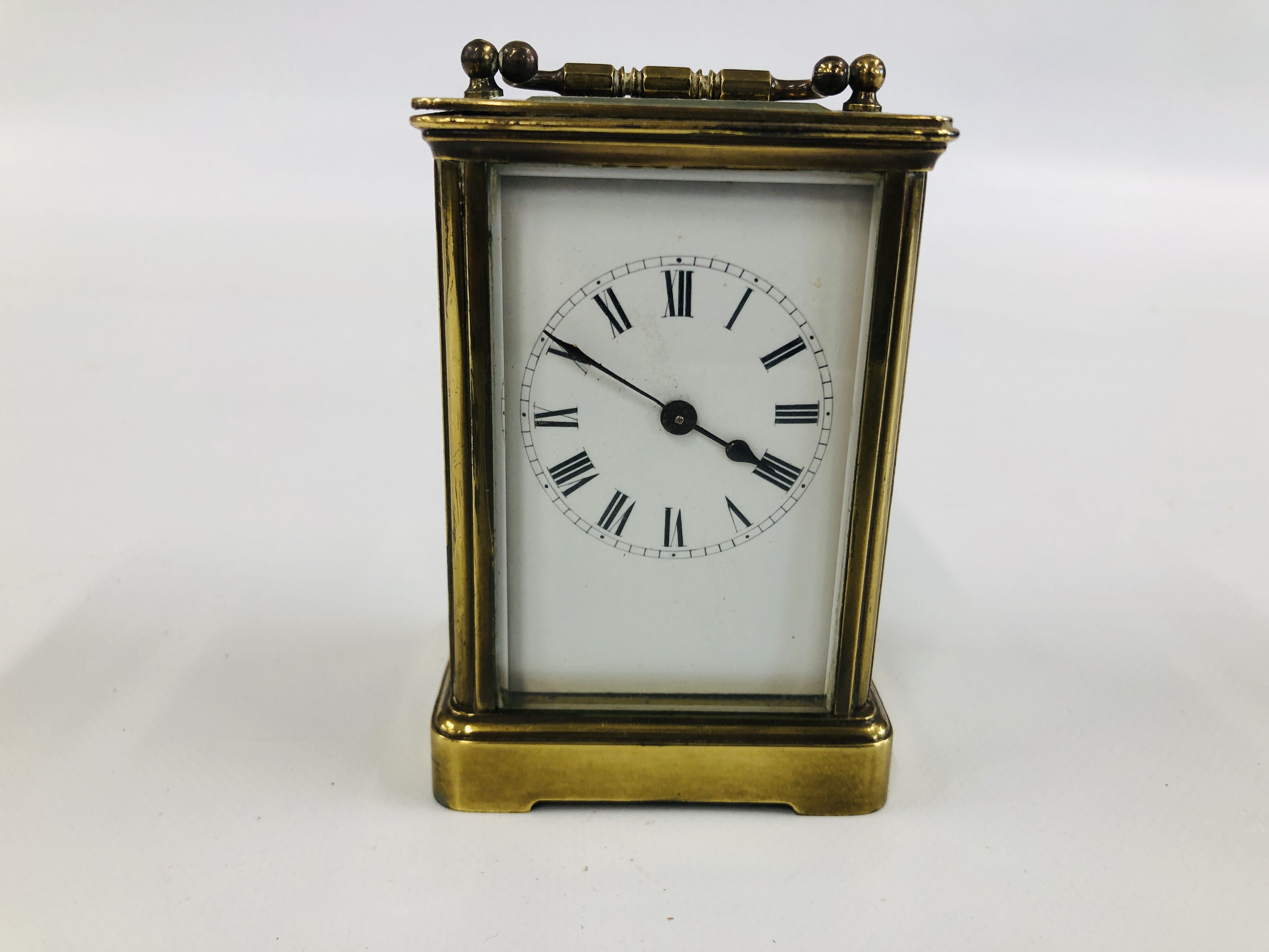 A VINTAGE BRASS CARRIAGE CLOCK H 11CM.