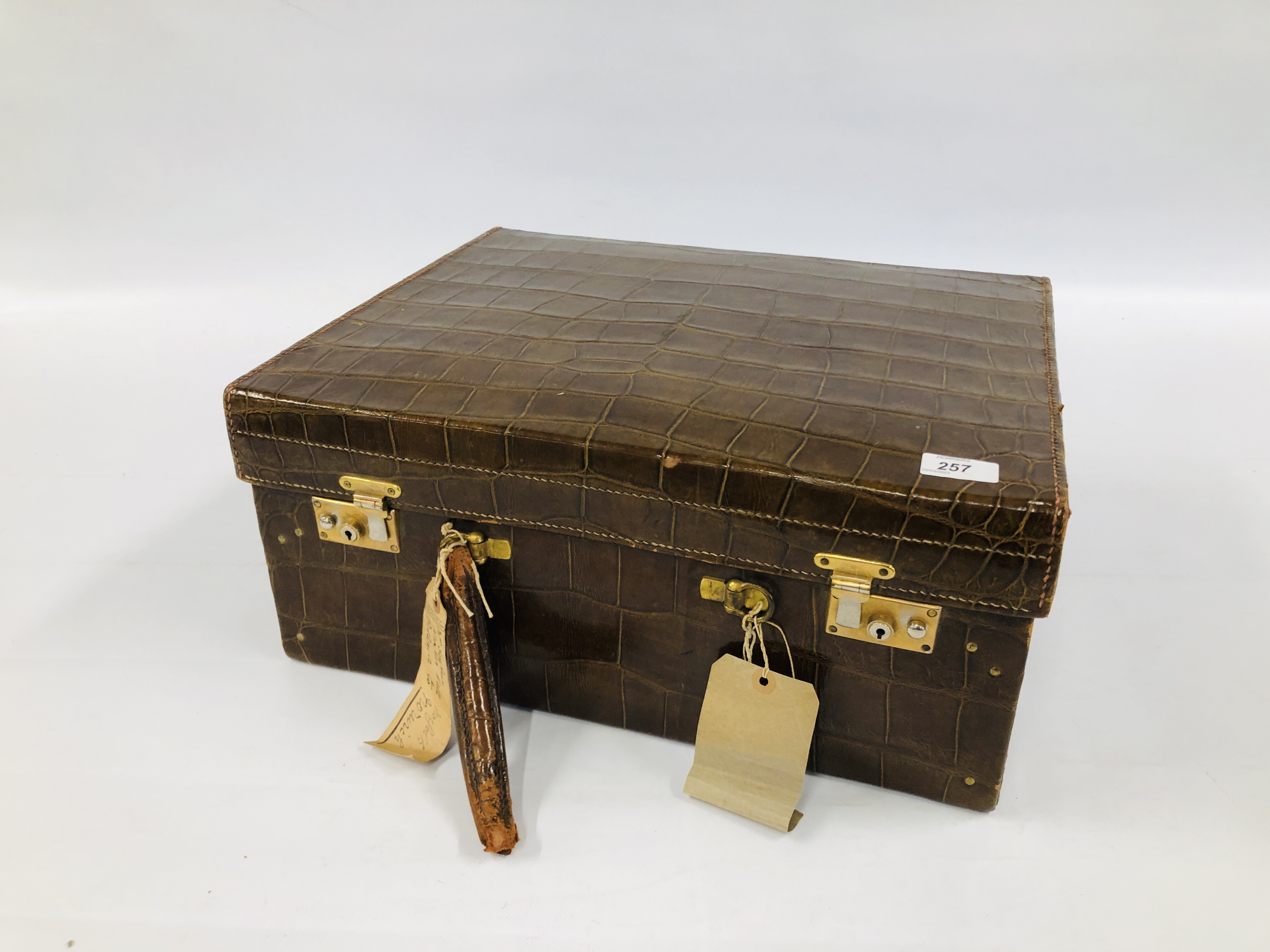 A VINTAGE CROCODILE FINISH LEATHER COMBINATION TRAVELLING VANITY / LUGGAGE CASE,