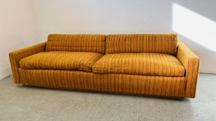 A MID C20TH FOUR SEATER SOFA,