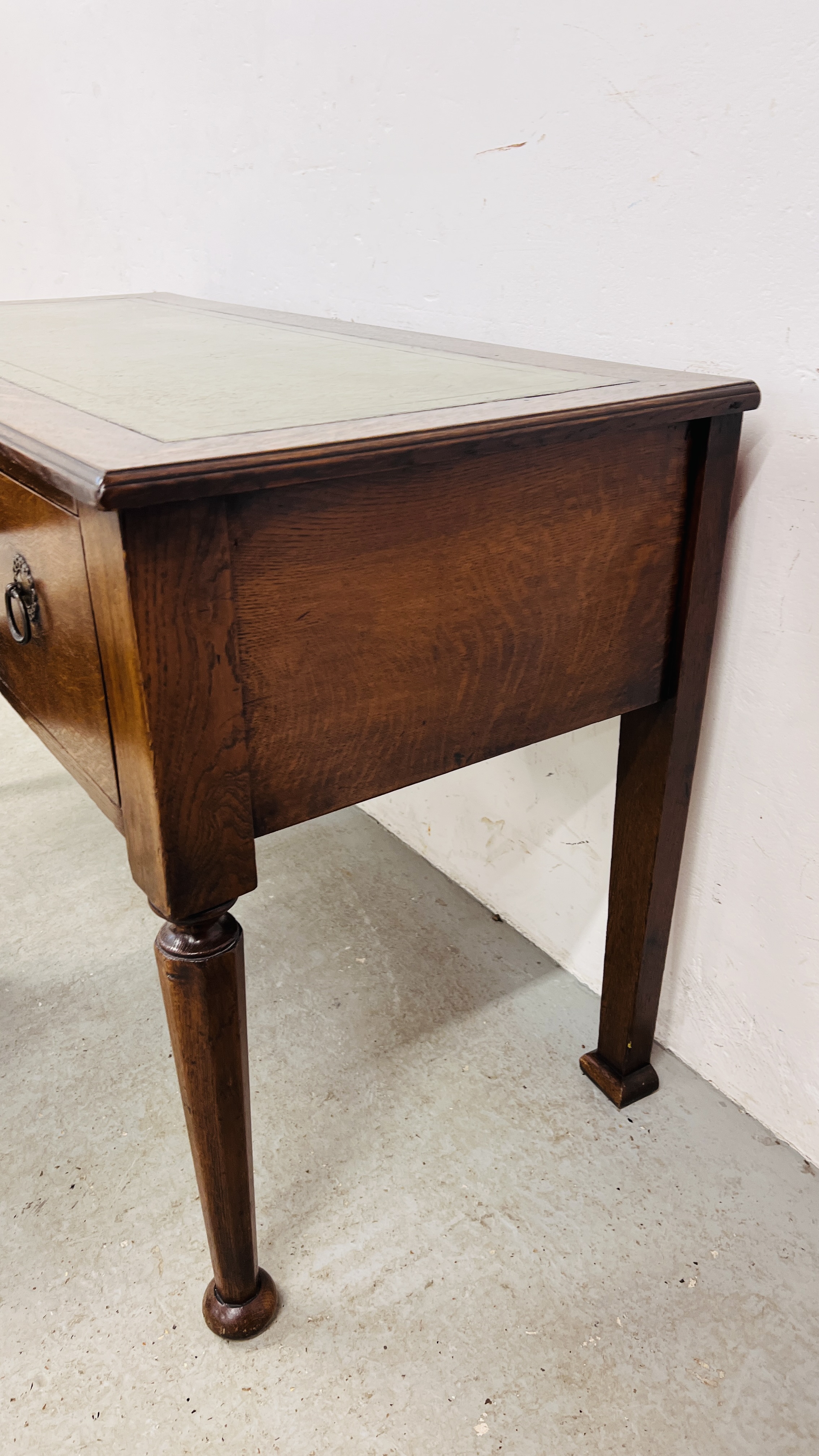 A SOLID OAK THREE DRAWER WRITING DESK WITH GREEN TOOLED LEATHERETTE WRITING SURFACE, W 120CM, - Image 13 of 16