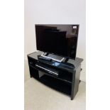 A SONY FLATSCREEN 32" TELEVISION SET WITH STAND MODEL KDL-32WD756. - SOLD AS SEEN.