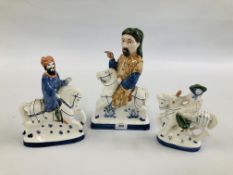 A RYE POTTERY FIGURE OF GEOFFREY CHAUCER ALONG WITH THE KNIGHT AND THE WIFE OF BATH.