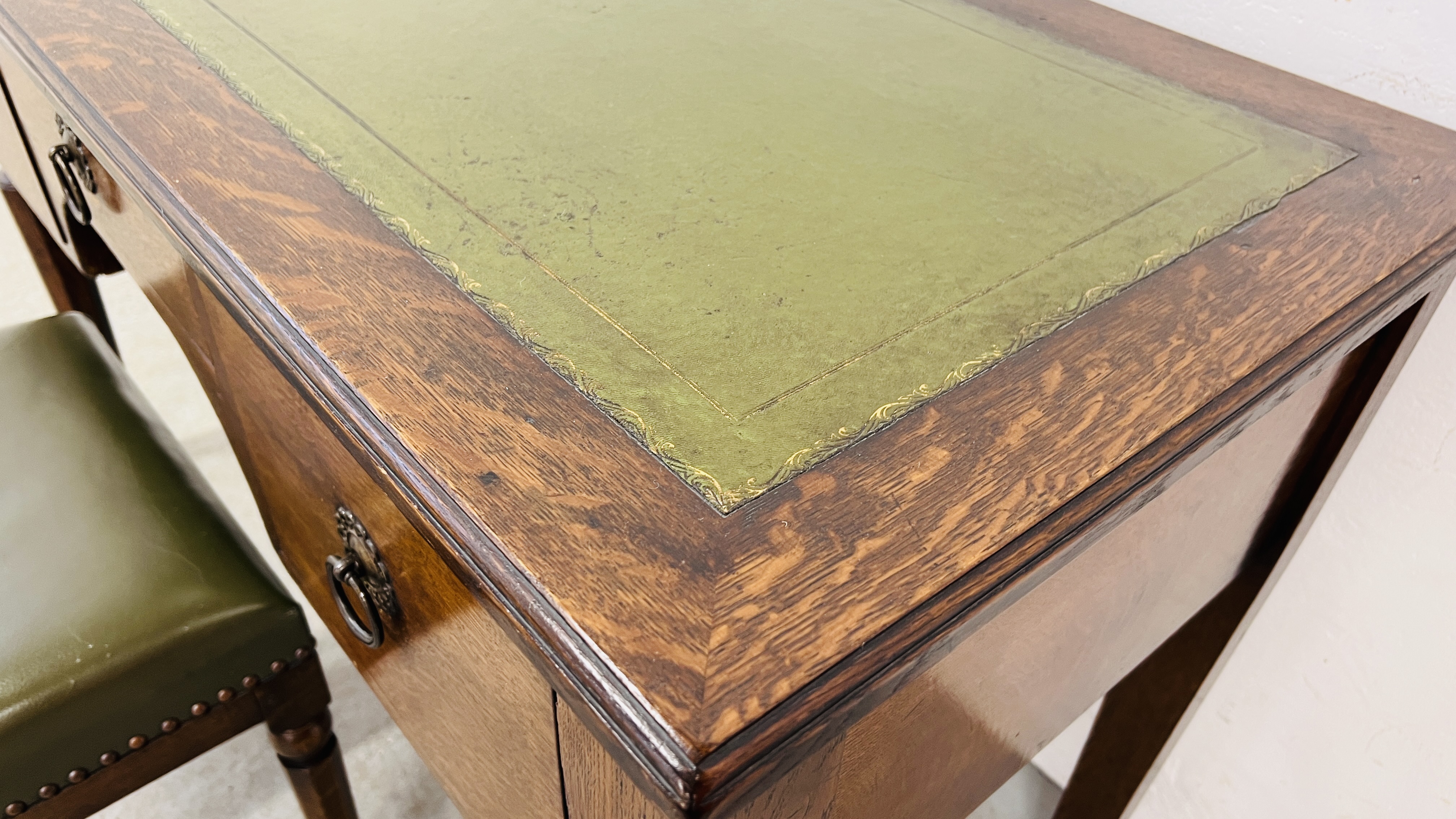 A SOLID OAK THREE DRAWER WRITING DESK WITH GREEN TOOLED LEATHERETTE WRITING SURFACE, W 120CM, - Image 5 of 16