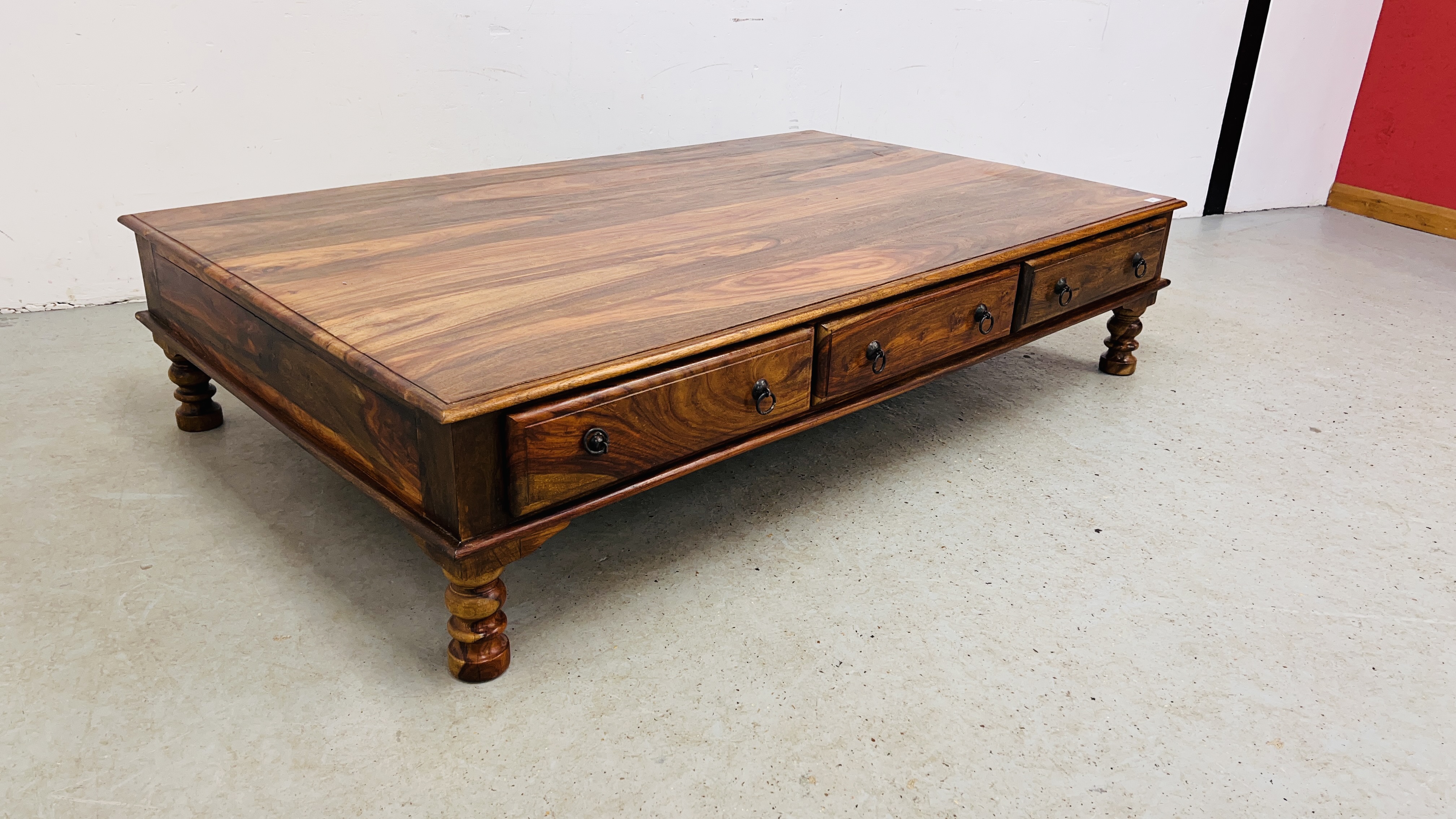 A MODERN ORIENTAL HARDWOOD COFFEE TABLE WITH FRIEZE DRAWERS 181CM. LONG. - Image 9 of 15