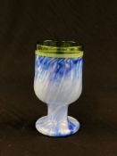 A MARBLED BLUE GOBLET WITH GREEN RIM,