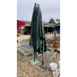 2 LARGE GARDEN WIND OUT PARASOLS WITH PARASOL STANDS.