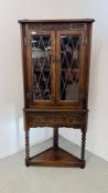 AN OLD CHARM OAK CORNER CABINET WITH SINGLE DRAWER AND LEADED GLASS DOOR - SPECIAL 1924-1999