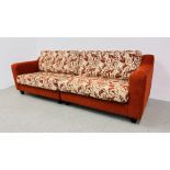 A LARGE MODERN RED UPHOLSTERED SOFA, WITH PATTERNED CUSHIONS - L 260CM. X H 80CM. X D 90CM.