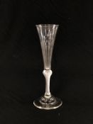 A GLASS WITH AIR TWIST STEM ON DOMED CIRCULAR FOOT,