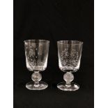 A GLASS GOBLET ENGRAVED AQUARIUS AND ANOTHER WITH MONOGRAM R & E 1968 APPROX 17CM H.