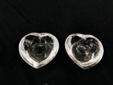 A PAIR OF ORREFORS GLASS HEART SHAPED TEA LIGHT HOLDERS.