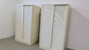 A PAIR OF WHITE FINISH WARDROBES WITH SLIDING LOWER DOORS W 100CM. X D 60CM. X H 176CM.