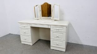 A MODERN WHITE FINISH SIX DRAWER DRESSING TABLE WITH TRIPLE MIRROR.