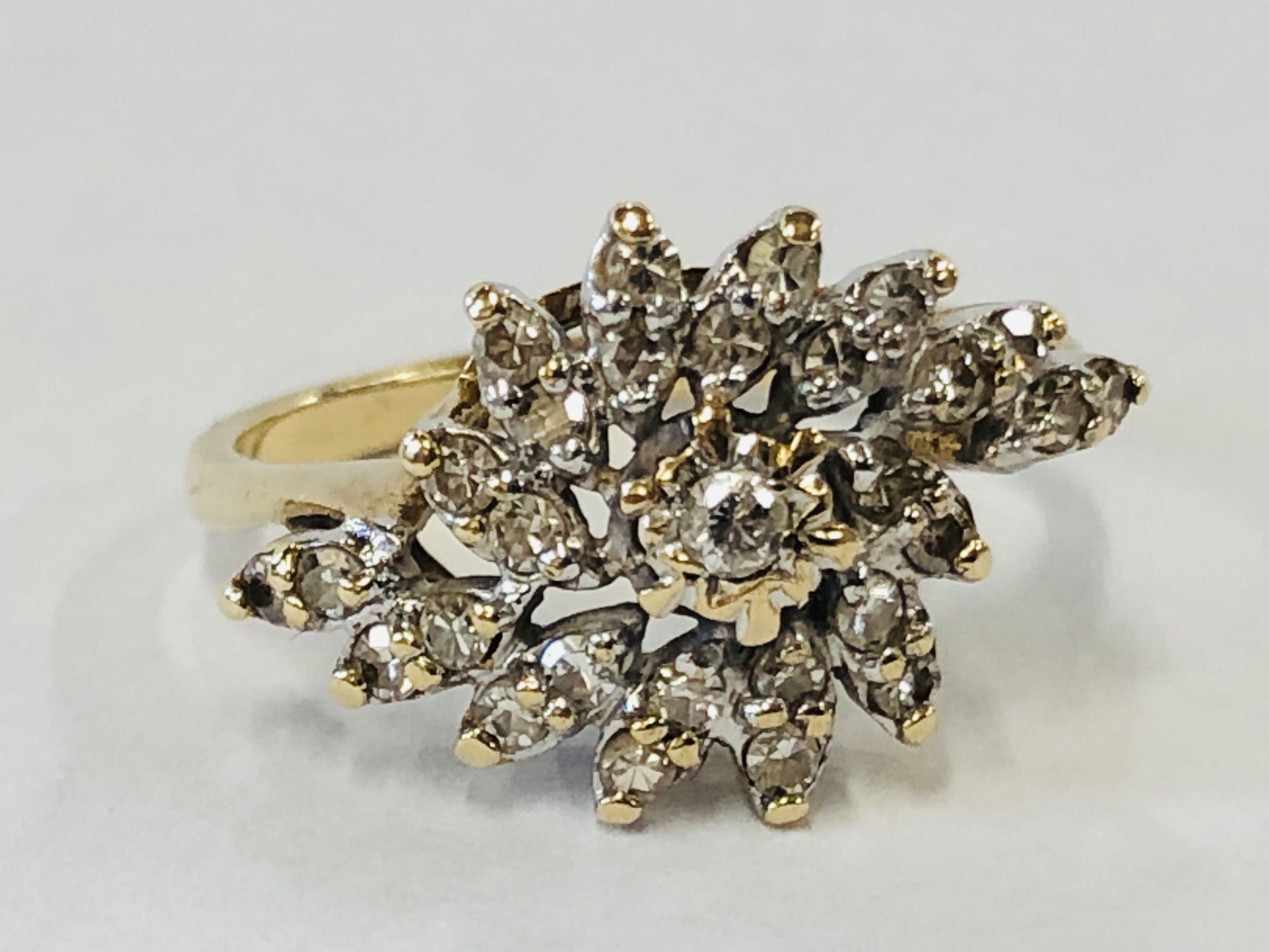 A 9CT GOLD DIAMOND CLUSTER RING. - Image 2 of 9