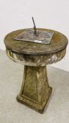 A STONEWORK GARDEN SUNDIAL - HEIGHT 63CM.