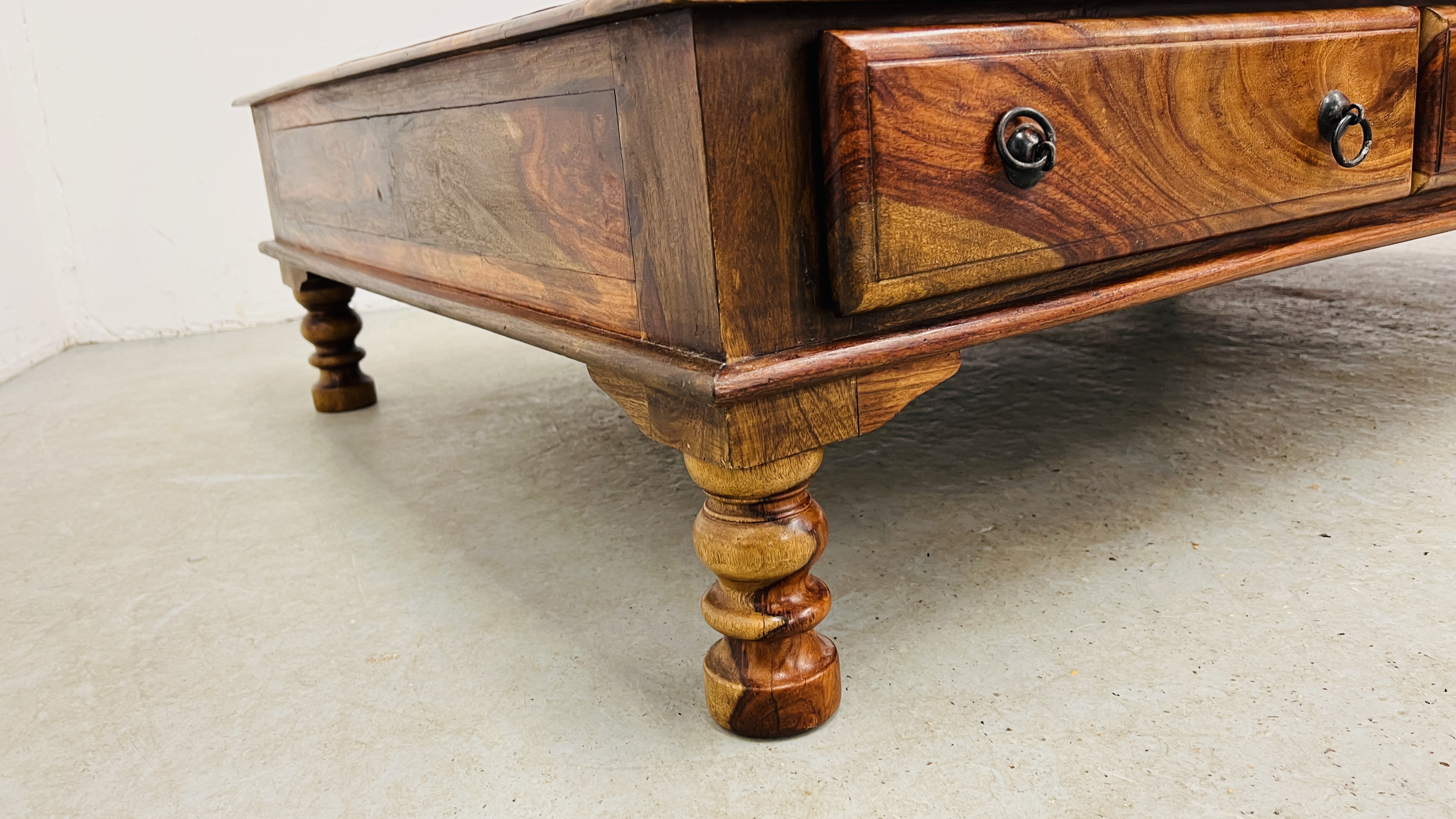 A MODERN ORIENTAL HARDWOOD COFFEE TABLE WITH FRIEZE DRAWERS 181CM. LONG. - Image 7 of 15