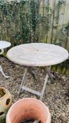 A CIRCULAR TEAK ALEXANDER ROSE GARDEN TABLE - DIAMETER 89CM.