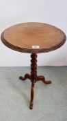 A VICTORIAN TRIPOD CIRCULAR WINE TABLE.