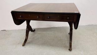 A REPRODUCTION REGENCY MAHOGANY SOFA TABLE WITH TWO FRIEZE DRAWERS.