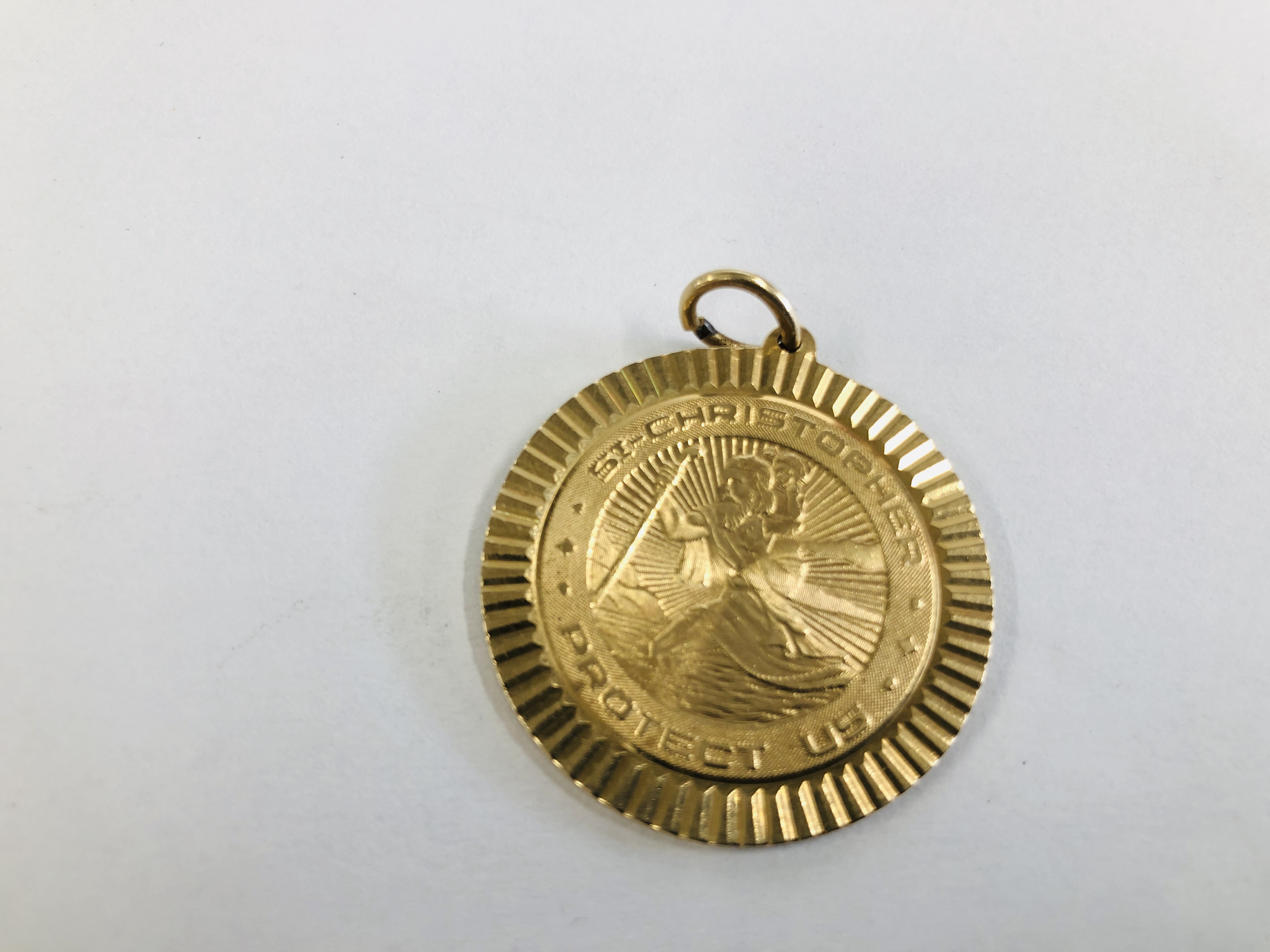 A "ST. CHRISTOPHER PROTECT US" PENDANT MARKED TIFFANY & CO 14K.