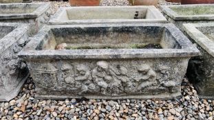 A PAIR OF HEAVY RECTANGULAR STONEWORK PLANTING TROUGHS WITH RELEIF CHERUB DECORATION. W 88CM.