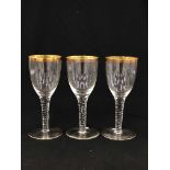 THREE TRUMPET BOWL GLASSES WITH GILDED RIMS. H 24CM.