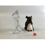 A GLASS MODEL OF A GLASS BLOWER, 11.5CM HIGH AND A POTTERY MODEL OF A MOUSE GLASS BLOWER.