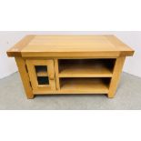 A SOLID LIGHT OAK TELEVISION STAND.