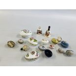 A COLLECTION OF TRINKET BOXES IN THE FORM OF EGGS TO INCLUDE LIMOGES EXAMPLES.