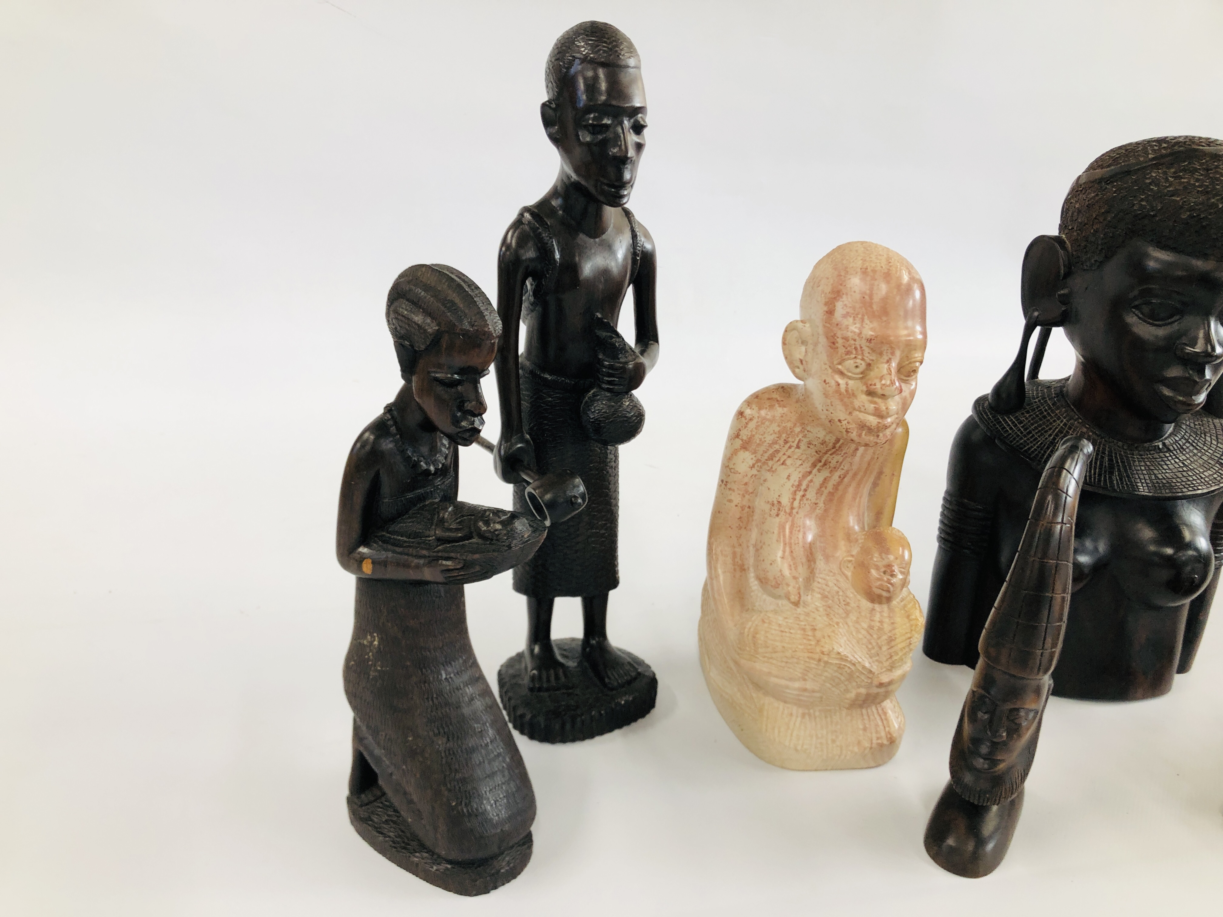 A HARD WOOD AFRICAN TRIBAL BUST ALONG WITH A FURTHER TWO FIGURES ONE OF WHICH IS HOLDING A NEW BORN - Image 5 of 5