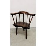 AN EARLY ANTIQUE OAK STICK BACK ARM CHAIR.