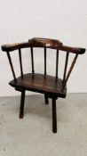 AN EARLY ANTIQUE OAK STICK BACK ARM CHAIR.