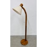 A PINE STANDARD READING LAMP - SOLD AS SEEN.
