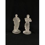 A PAIR OF C20TH FRENCH GLASS FIGURES OF A FRENCH LEGIONNAIRE AND AN ALGERIAN, 24CM HIGH.