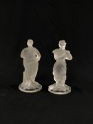 A PAIR OF C20TH FRENCH GLASS FIGURES OF A FRENCH LEGIONNAIRE AND AN ALGERIAN, 24CM HIGH.