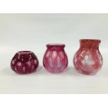 THREE PALE PINK STUDIO GLASS VASES WITH AIR TRAPPED DECORATION DESIGNED BY RSW.