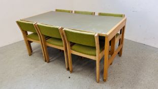 A MODERN BEECH WOOD DESK L 173CM X D 82CM X H 73CM ALONG WITH A SET OF 6 BEECH FRAMED DINING CHAIRS.