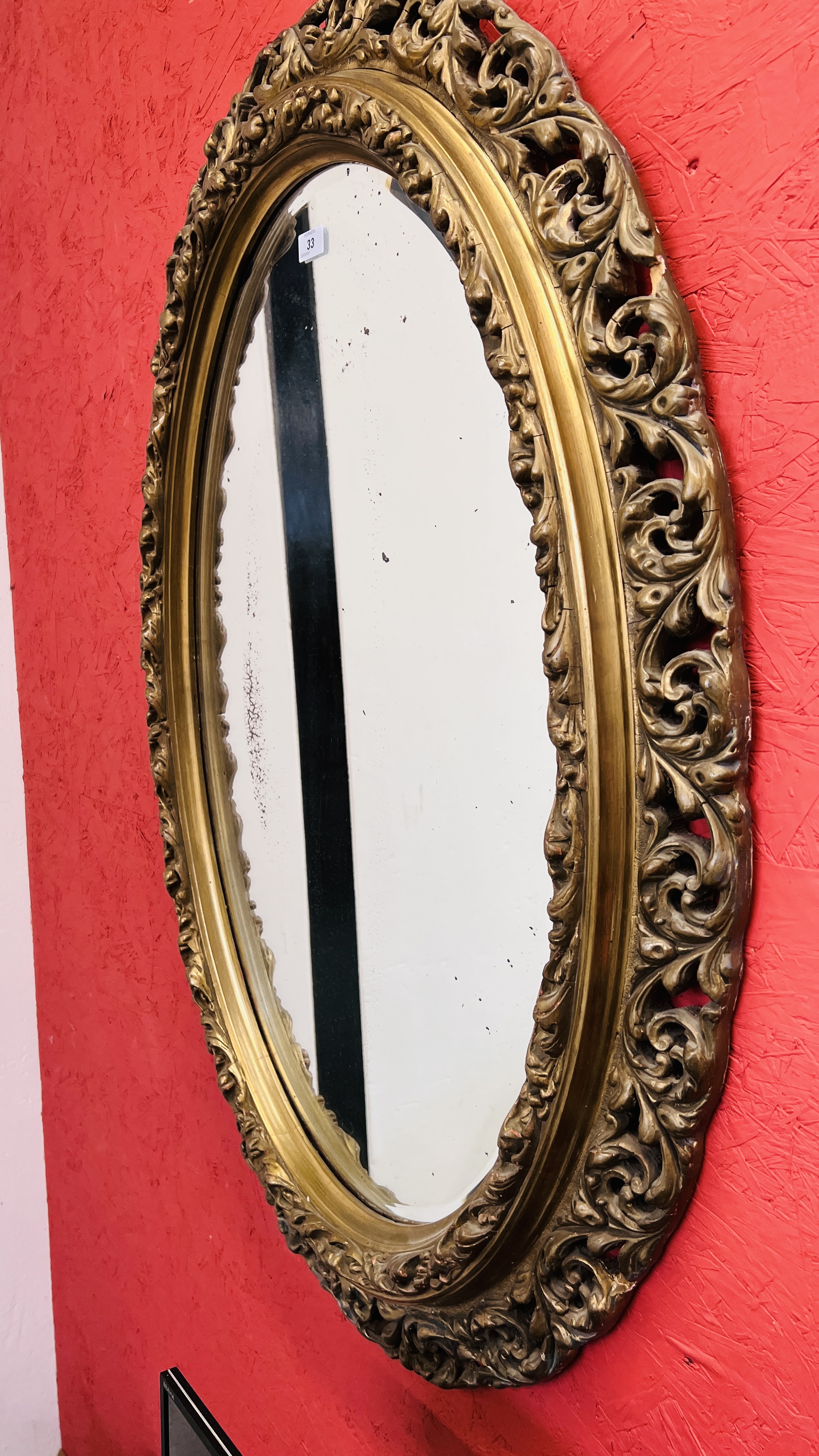 A C19TH GILT OVAL WALL MIRROR, 110CM HIGH. - Image 4 of 7