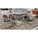 A LARGE STONEWORK GARDEN URN ON SQUARE BASE - HEIGHT 67CM X DIAMETER 67CM ALONG WITH A PAIR OF