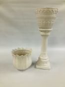 A WHITE GLAZED PORTUGESE STYLE JARDINIERE ON A COLUMN STAND ALONG WITH A FURTHER SIMILAR JARDINIERE.