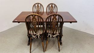 AN OLD CHARM STYLE REFECTORY DINING TABLE AND SET OF FOUR TRADITIONAL WHEEL BACK DINING CHAIRS -