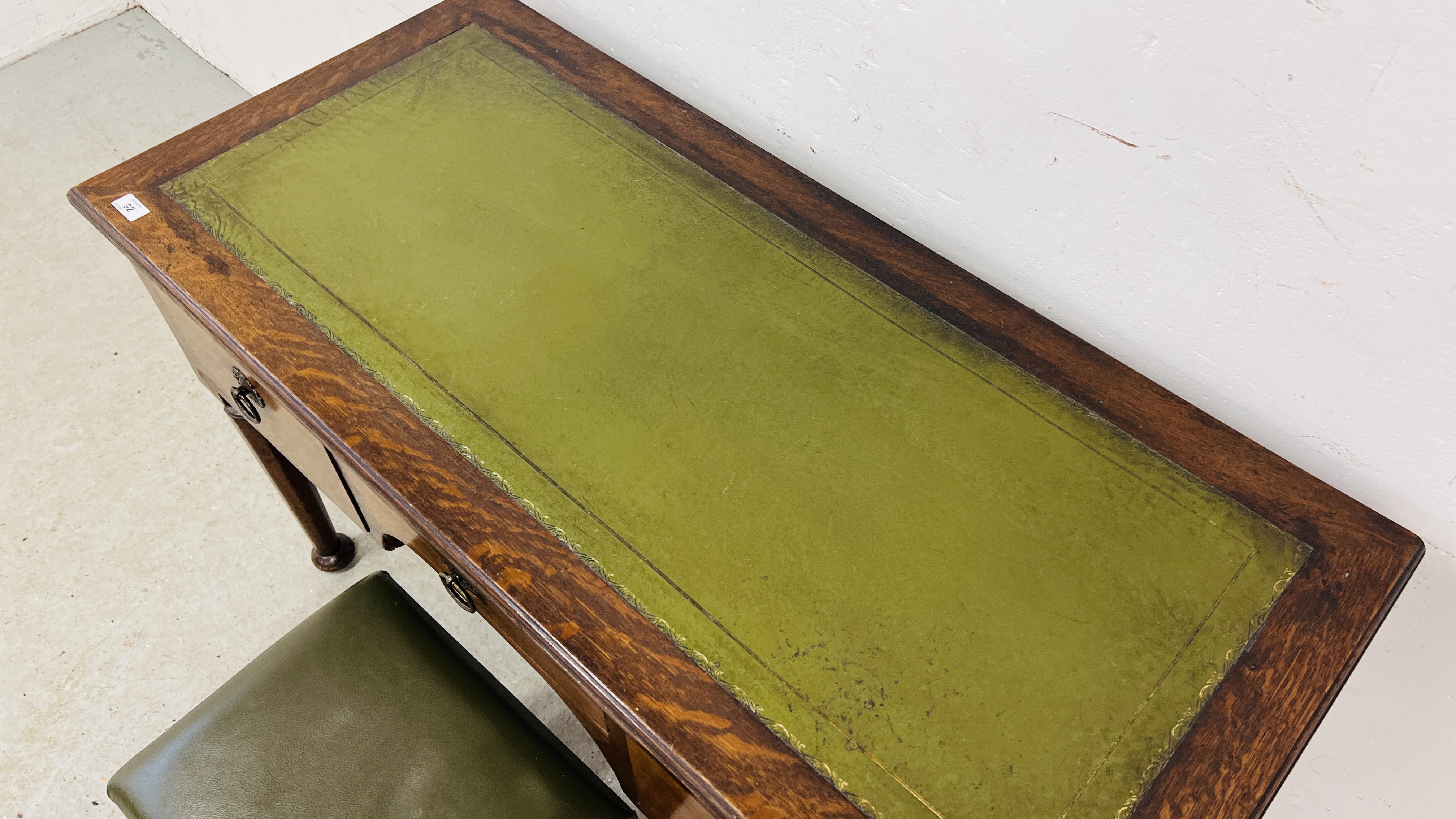 A SOLID OAK THREE DRAWER WRITING DESK WITH GREEN TOOLED LEATHERETTE WRITING SURFACE, W 120CM, - Image 6 of 16
