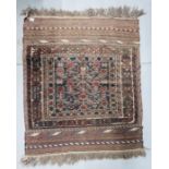 A BLUE / BROWN EASTERN RUG, 139 X 119CM.