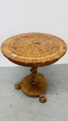 A VICTORIAN INLAID WALNUT CIRCULAR TABLE ON A CORKSCREW COLUMN AND A CIRCULAR BASE AND LIONS CLAW